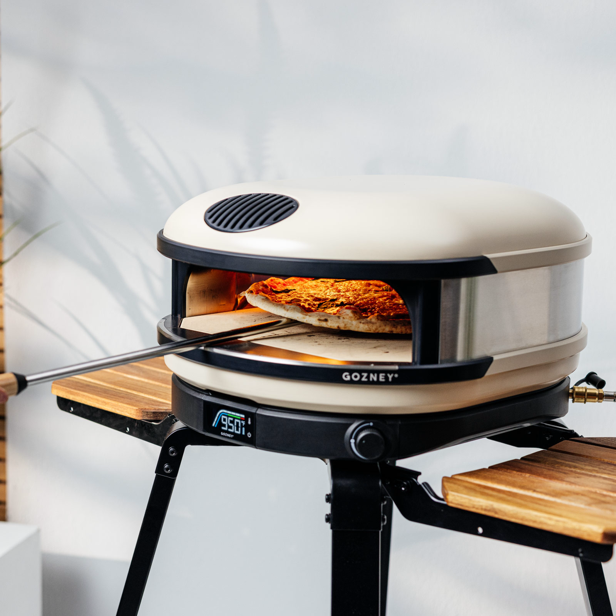 Gozney Arc oven and wooden side shelves on the Arc + Arc XL Stand