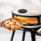 Pizza coming out of the Gozney Arc XL in Bone