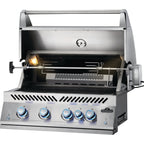 Napoleon 700 Series 32 built-in grill with the lid open, rotisserie and interior lights
