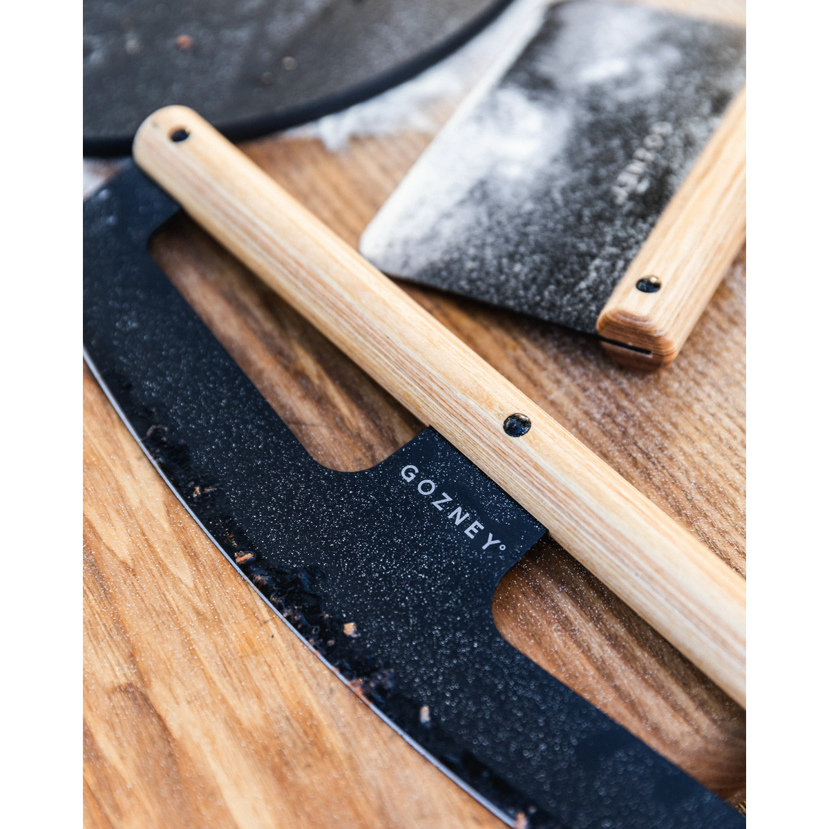 Gozney Pizza Rocker on a wooden board