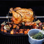Chicken roasting on the Masterbuilt Gravity Series rotisserie kit