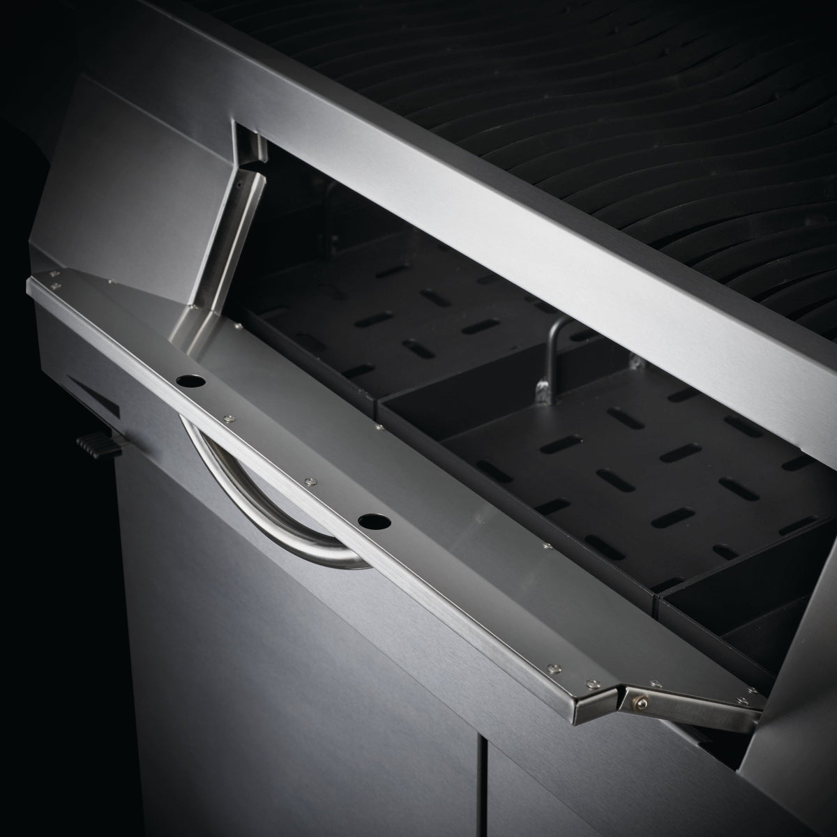 Front charcoal access door on the Napoleon Professional 605