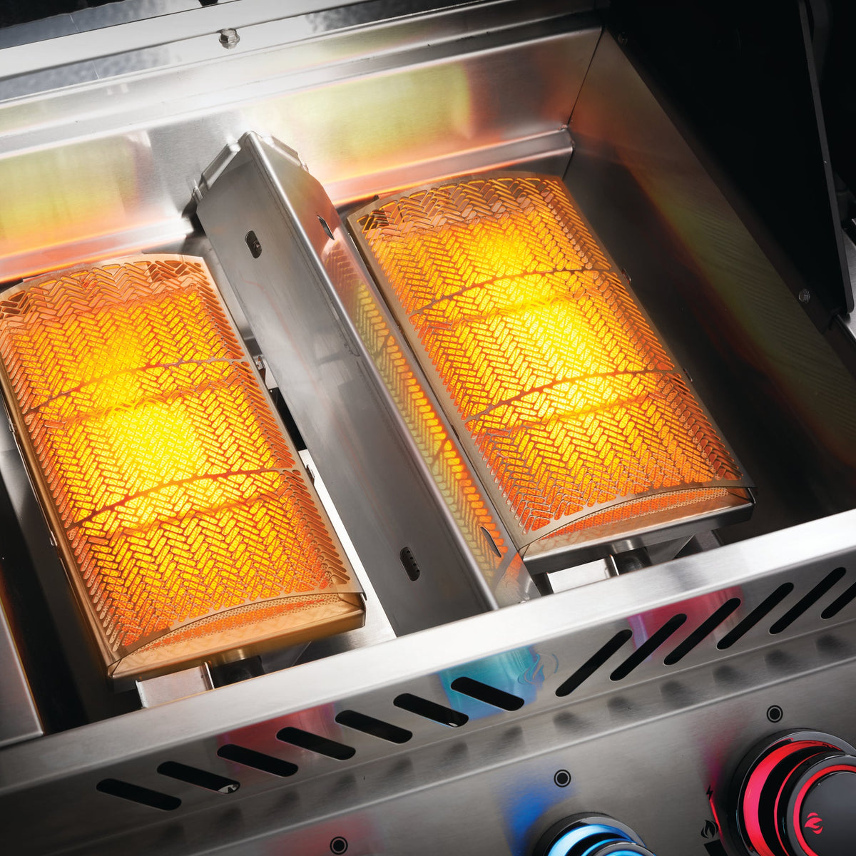 Infrared sear burners glowing on the Napoleon Prestige PRO 825