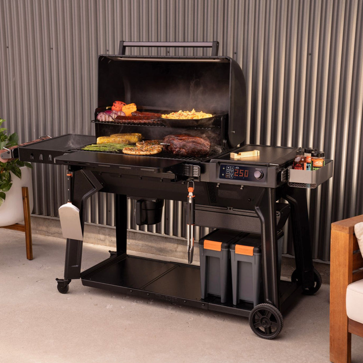 Traeger Woodridge Pro cooking a full grill of food on a patio