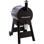 Traeger Pro Series 22 in blue, grease bucket side view