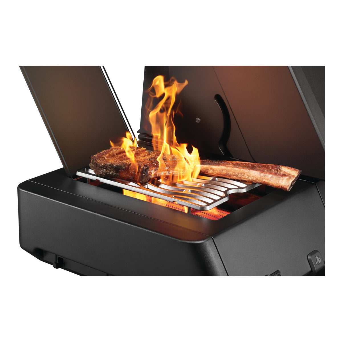 Tomahawk steak searing on the infrared side burner of the Napoleon Prestige 500 Phantom Connected