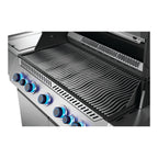 Close-up of the wave-shaped cooking grids and control knobs on the Napoleon Prestige 665 Connected