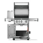 Napoleon Rogue PRO 425 SIB Gas BBQ with the lid, side burner and cabinet door open