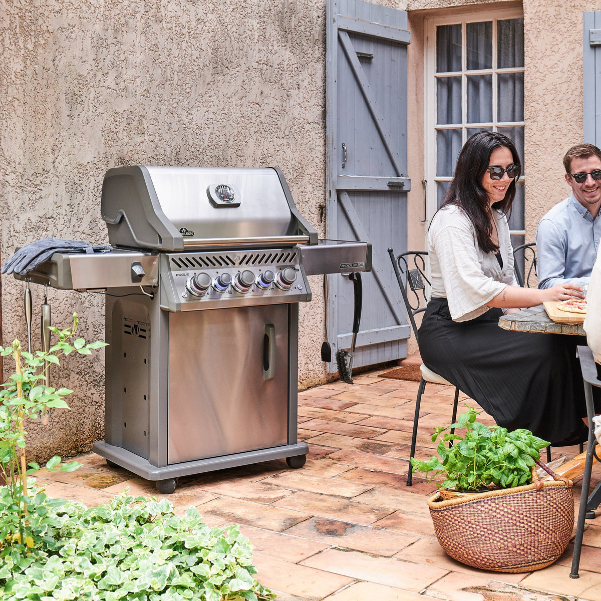Napoleon Rogue PRO-S 425 Gas BBQ on a terracotta courtyard